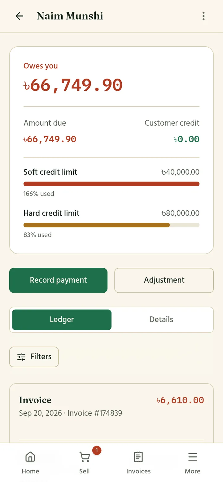 A customer page on a phone showing the amount owed, credit limits, Record payment, and the ledger